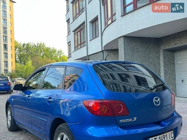 Синий Мазда 3, объемом двигателя 1.35 л и пробегом 185 тыс. км за 2599 $, фото 10 на Automoto.ua