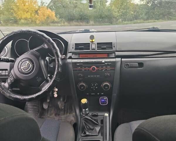 Синій Мазда 3, об'ємом двигуна 1.6 л та пробігом 372 тис. км за 4600 $, фото 3 на Automoto.ua