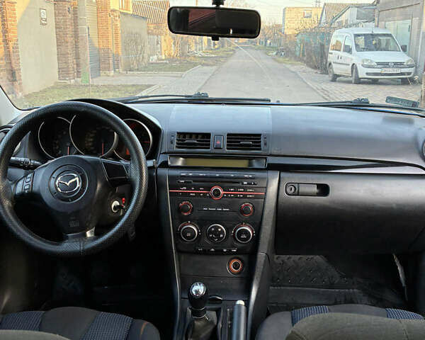 Синій Мазда 3, об'ємом двигуна 1.6 л та пробігом 289 тис. км за 3699 $, фото 7 на Automoto.ua