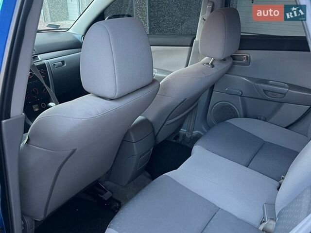 Синий Мазда 3, объемом двигателя 1.35 л и пробегом 185 тыс. км за 2599 $, фото 12 на Automoto.ua