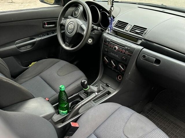 Синий Мазда 3, объемом двигателя 1.56 л и пробегом 440 тыс. км за 3200 $, фото 10 на Automoto.ua