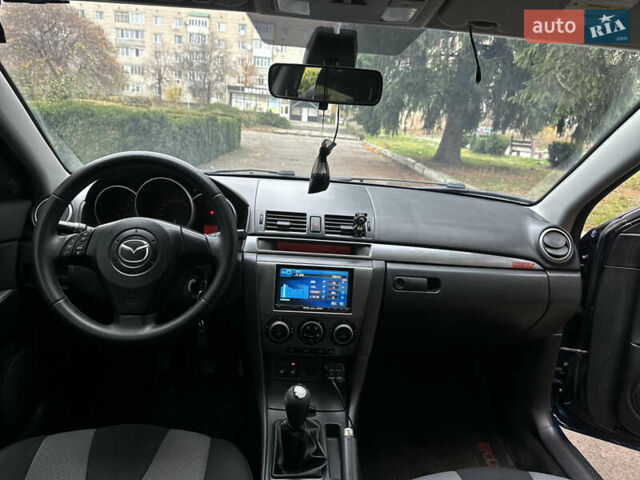 Синий Мазда 3, объемом двигателя 1.6 л и пробегом 238 тыс. км за 3700 $, фото 30 на Automoto.ua