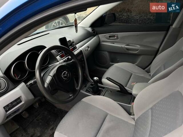Синий Мазда 3, объемом двигателя 1.4 л и пробегом 169 тыс. км за 3999 $, фото 14 на Automoto.ua
