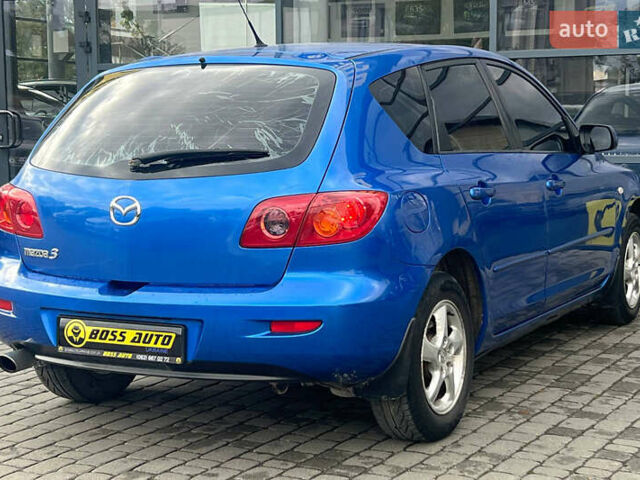 Синий Мазда 3, объемом двигателя 1.35 л и пробегом 182 тыс. км за 3900 $, фото 6 на Automoto.ua