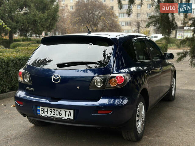 Синий Мазда 3, объемом двигателя 1.6 л и пробегом 237 тыс. км за 3950 $, фото 3 на Automoto.ua