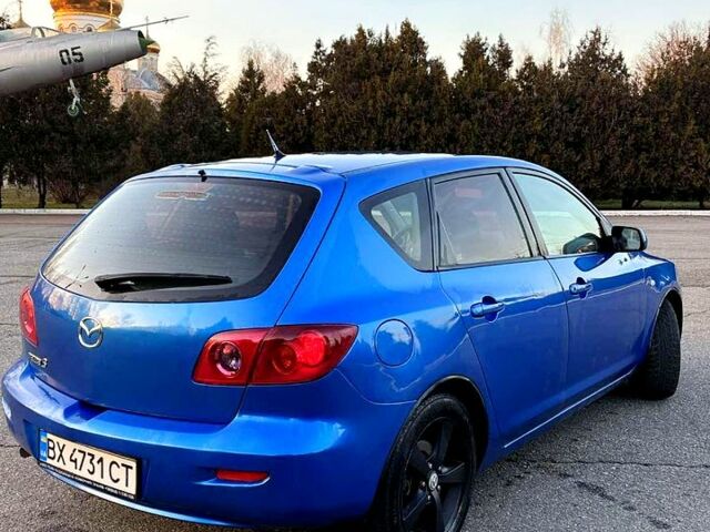 Синий Мазда 3, объемом двигателя 1.6 л и пробегом 289 тыс. км за 3699 $, фото 3 на Automoto.ua
