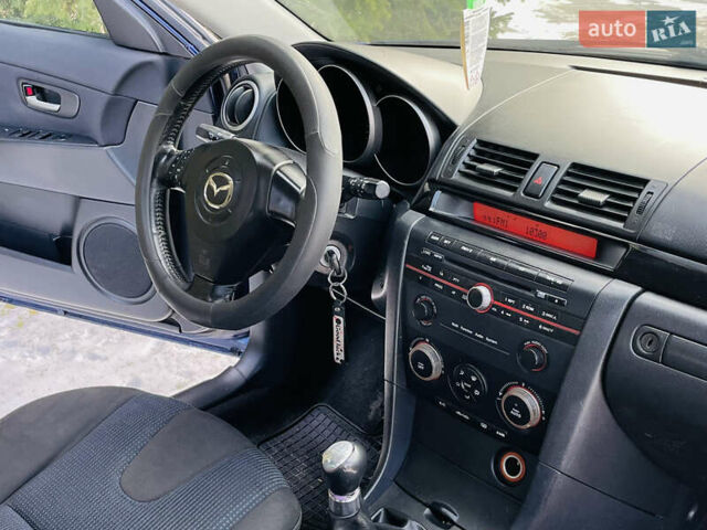 Синій Мазда 3, об'ємом двигуна 1.4 л та пробігом 190 тис. км за 2950 $, фото 15 на Automoto.ua