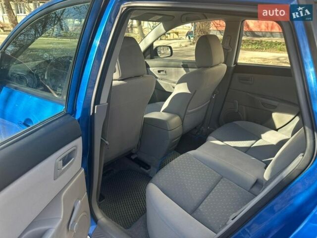 Синий Мазда 3, объемом двигателя 1.4 л и пробегом 256 тыс. км за 4000 $, фото 7 на Automoto.ua