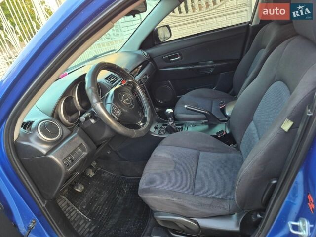 Синій Мазда 3, об'ємом двигуна 1.6 л та пробігом 233 тис. км за 2999 $, фото 31 на Automoto.ua