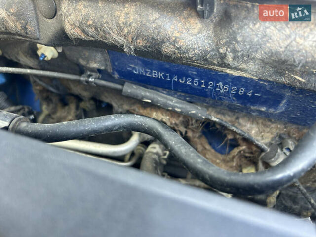 Синий Мазда 3, объемом двигателя 1.35 л и пробегом 170 тыс. км за 3900 $, фото 9 на Automoto.ua