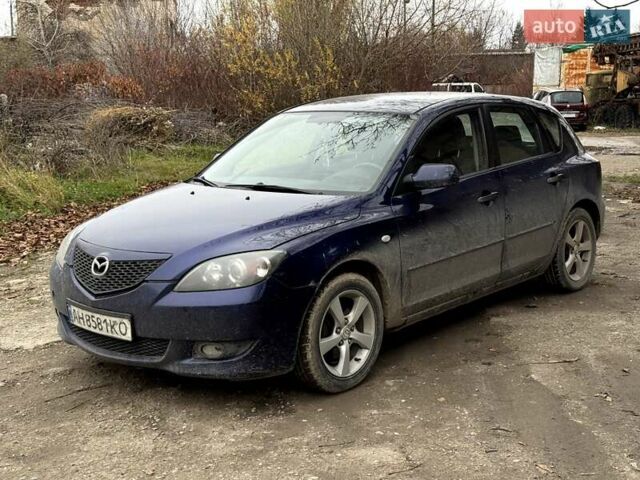 Синий Мазда 3, объемом двигателя 1.6 л и пробегом 287 тыс. км за 2100 $, фото 3 на Automoto.ua