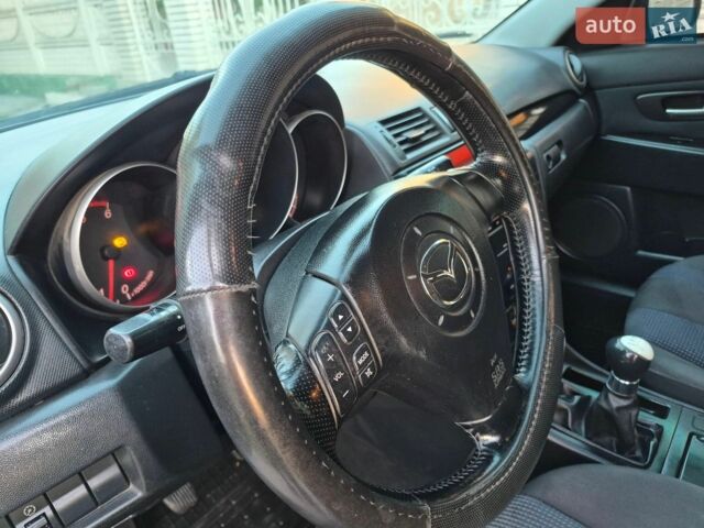 Синій Мазда 3, об'ємом двигуна 1.6 л та пробігом 233 тис. км за 3100 $, фото 33 на Automoto.ua