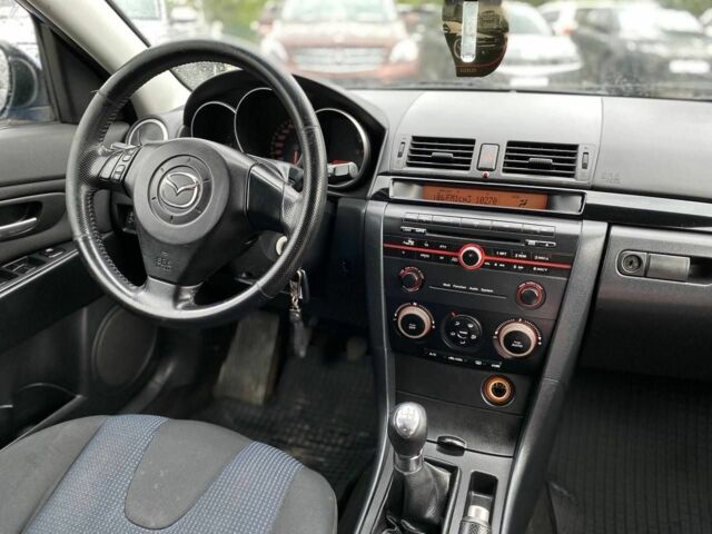 Синий Мазда 3, объемом двигателя 1.6 л и пробегом 272 тыс. км за 4100 $, фото 15 на Automoto.ua