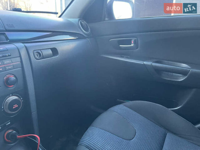 Синій Мазда 3, об'ємом двигуна 1.56 л та пробігом 320 тис. км за 5100 $, фото 11 на Automoto.ua