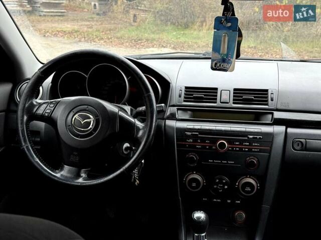 Синий Мазда 3, объемом двигателя 1.6 л и пробегом 287 тыс. км за 2100 $, фото 2 на Automoto.ua