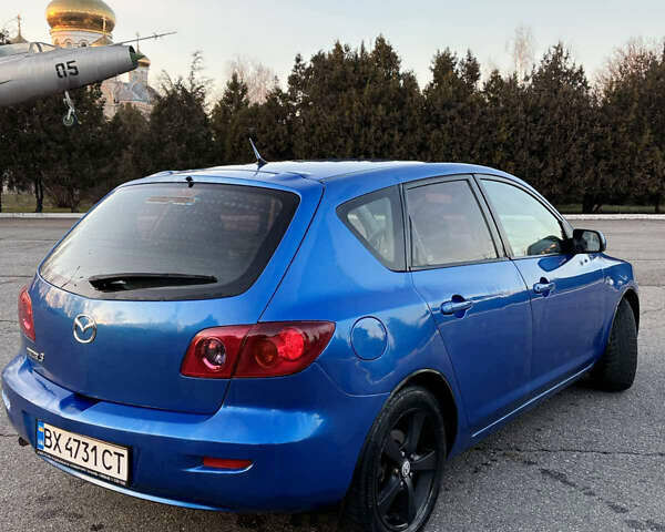 Синій Мазда 3, об'ємом двигуна 1.6 л та пробігом 289 тис. км за 3699 $, фото 4 на Automoto.ua