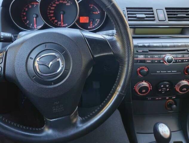 Синий Мазда 3, объемом двигателя 1.6 л и пробегом 220 тыс. км за 3750 $, фото 12 на Automoto.ua