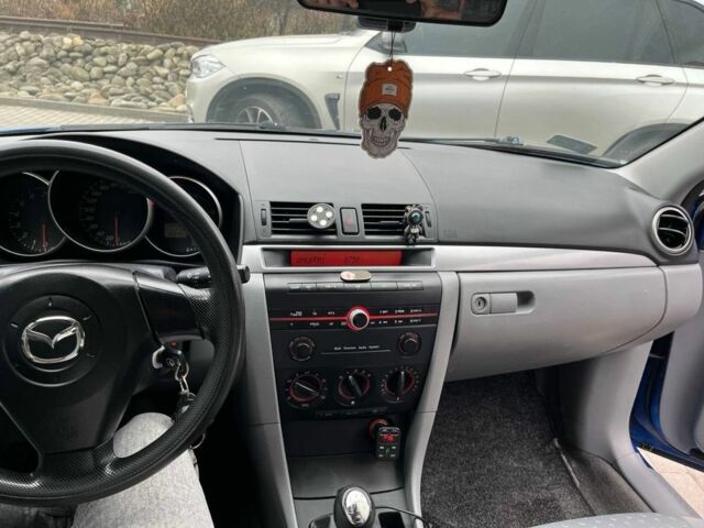 Синий Мазда 3, объемом двигателя 1.3 л и пробегом 182 тыс. км за 2900 $, фото 12 на Automoto.ua