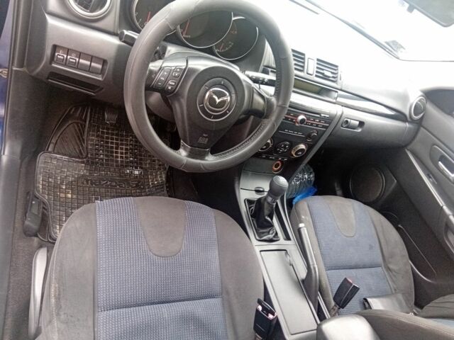 Синій Мазда 3, об'ємом двигуна 1.3 л та пробігом 260 тис. км за 4700 $, фото 5 на Automoto.ua