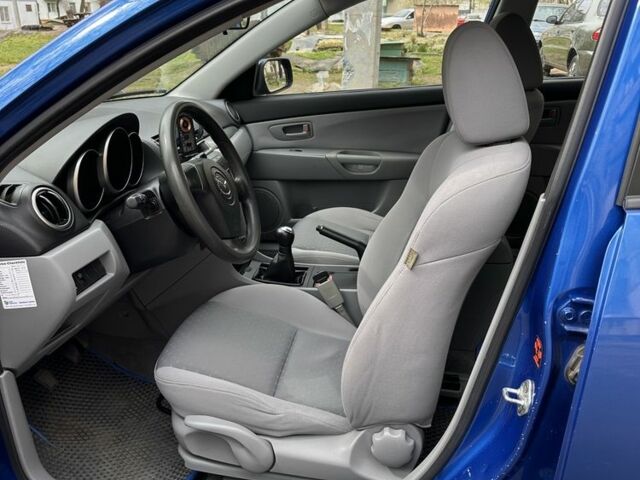 Синий Мазда 3, объемом двигателя 1.3 л и пробегом 256 тыс. км за 4000 $, фото 6 на Automoto.ua