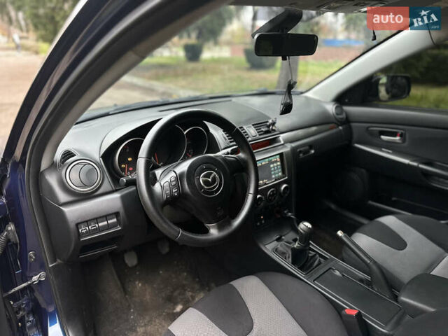 Синий Мазда 3, объемом двигателя 1.6 л и пробегом 237 тыс. км за 3950 $, фото 25 на Automoto.ua
