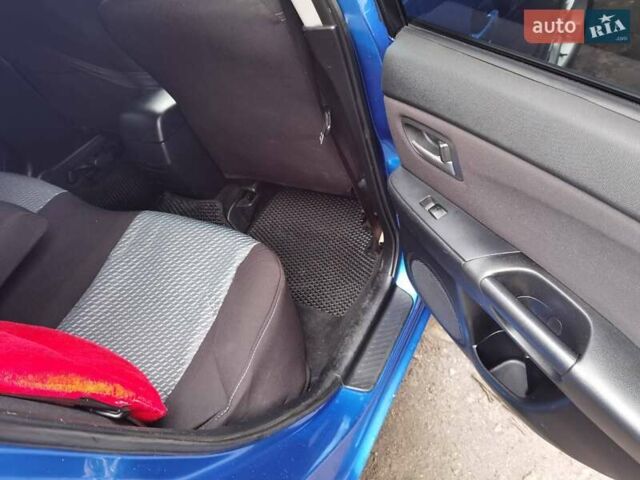 Синий Мазда 3, объемом двигателя 1.56 л и пробегом 253 тыс. км за 4200 $, фото 5 на Automoto.ua