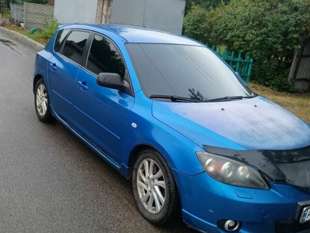 Синий Мазда 3, объемом двигателя 2 л и пробегом 376 тыс. км за 2409 $, фото 2 на Automoto.ua