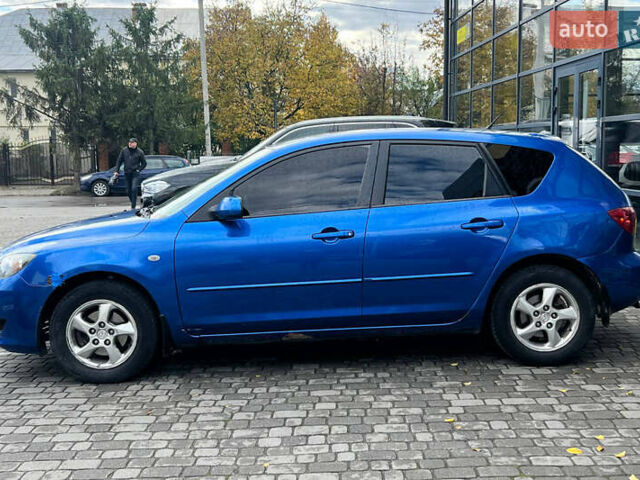 Синий Мазда 3, объемом двигателя 1.35 л и пробегом 182 тыс. км за 3900 $, фото 3 на Automoto.ua