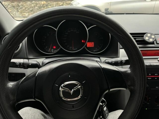 Синий Мазда 3, объемом двигателя 1.3 л и пробегом 182 тыс. км за 2900 $, фото 11 на Automoto.ua