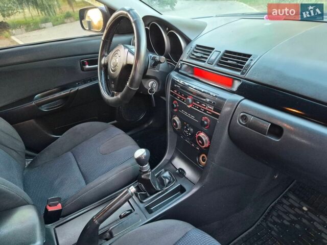 Синій Мазда 3, об'ємом двигуна 1.6 л та пробігом 233 тис. км за 3100 $, фото 29 на Automoto.ua