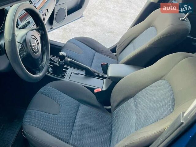 Синій Мазда 3, об'ємом двигуна 1.4 л та пробігом 190 тис. км за 2950 $, фото 24 на Automoto.ua