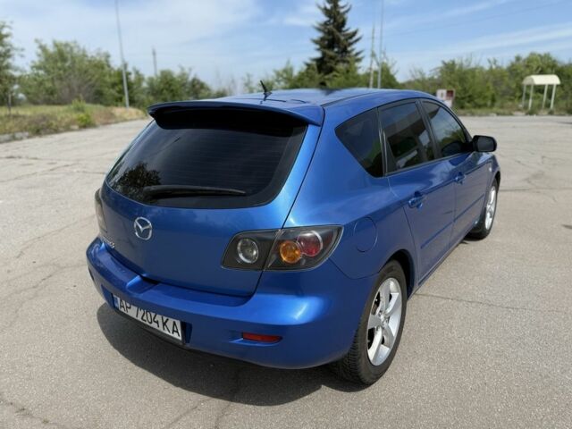 Синий Мазда 3, объемом двигателя 1.6 л и пробегом 252 тыс. км за 2950 $, фото 1 на Automoto.ua