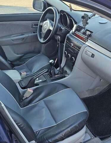 Синий Мазда 3, объемом двигателя 1.56 л и пробегом 360 тыс. км за 4200 $, фото 4 на Automoto.ua