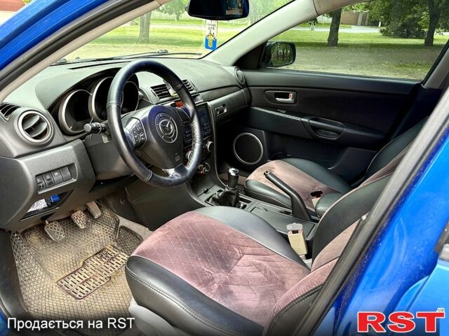 Синій Мазда 3, об'ємом двигуна 1.3 л та пробігом 243 тис. км за 3300 $, фото 4 на Automoto.ua