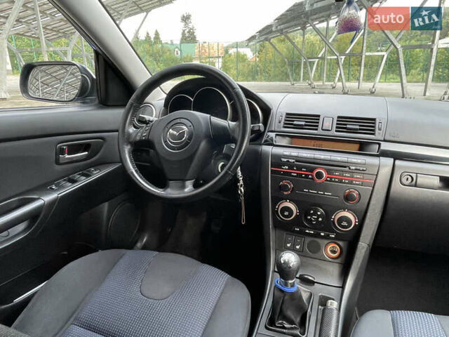 Синий Мазда 3, объемом двигателя 1.6 л и пробегом 207 тыс. км за 4690 $, фото 40 на Automoto.ua