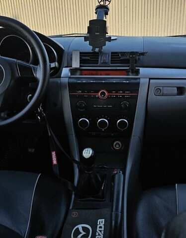 Синий Мазда 3, объемом двигателя 1.56 л и пробегом 360 тыс. км за 4200 $, фото 3 на Automoto.ua