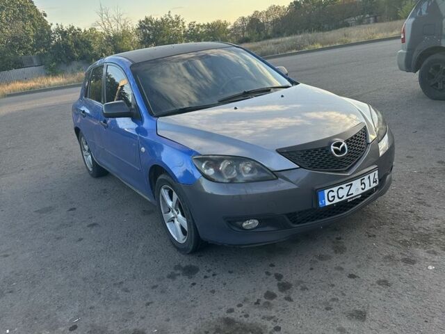 Синий Мазда 3, объемом двигателя 2 л и пробегом 3 тыс. км за 1989 $, фото 5 на Automoto.ua