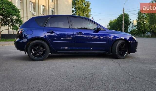 Синий Мазда 3, объемом двигателя 1.6 л и пробегом 275 тыс. км за 4999 $, фото 3 на Automoto.ua