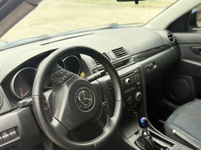 Синий Мазда 3, объемом двигателя 1.6 л и пробегом 252 тыс. км за 2950 $, фото 5 на Automoto.ua