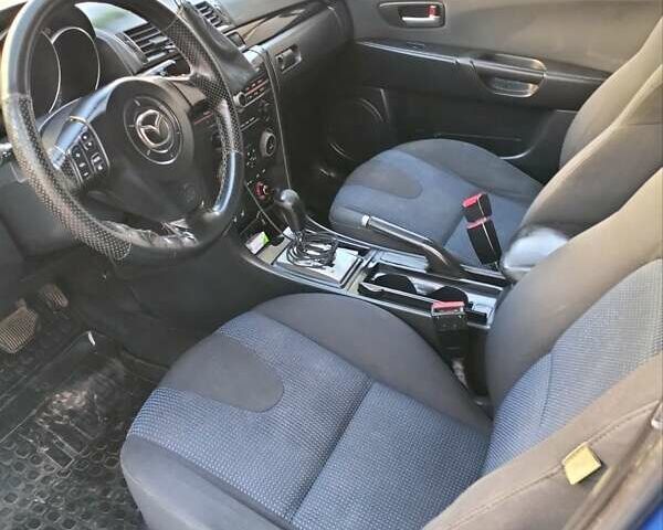 Синий Мазда 3, объемом двигателя 1.6 л и пробегом 220 тыс. км за 3600 $, фото 7 на Automoto.ua
