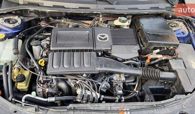 Синий Мазда 3, объемом двигателя 1.6 л и пробегом 275 тыс. км за 4999 $, фото 18 на Automoto.ua