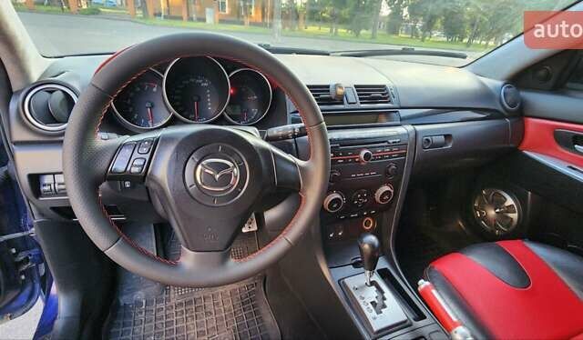 Синий Мазда 3, объемом двигателя 1.6 л и пробегом 275 тыс. км за 4999 $, фото 12 на Automoto.ua