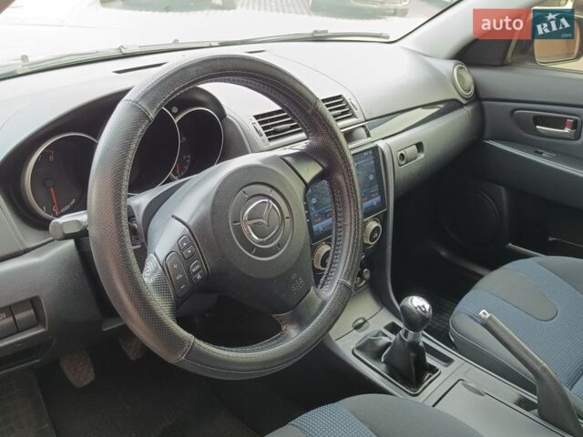 Синий Мазда 3, объемом двигателя 1.6 л и пробегом 181 тыс. км за 5200 $, фото 21 на Automoto.ua
