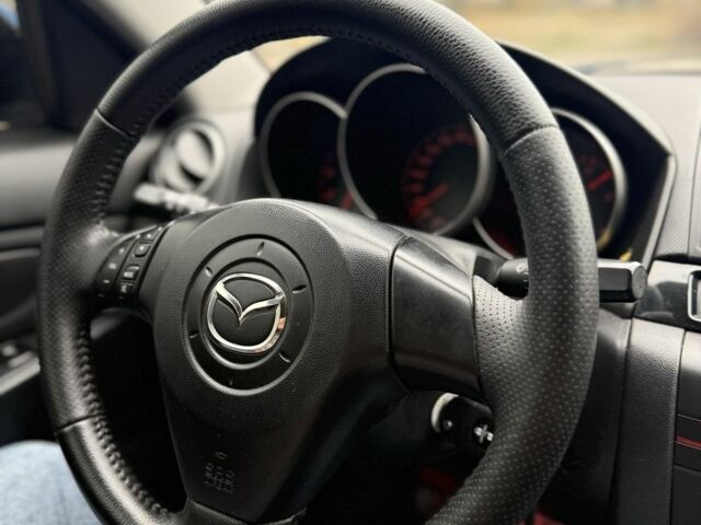 Синий Мазда 3, объемом двигателя 1.6 л и пробегом 252 тыс. км за 2950 $, фото 8 на Automoto.ua