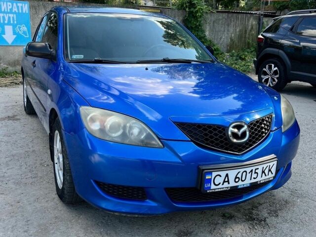 Синий Мазда 3, объемом двигателя 1.4 л и пробегом 214 тыс. км за 3800 $, фото 1 на Automoto.ua