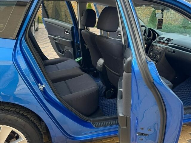 Синий Мазда 3, объемом двигателя 1.6 л и пробегом 268 тыс. км за 4550 $, фото 8 на Automoto.ua