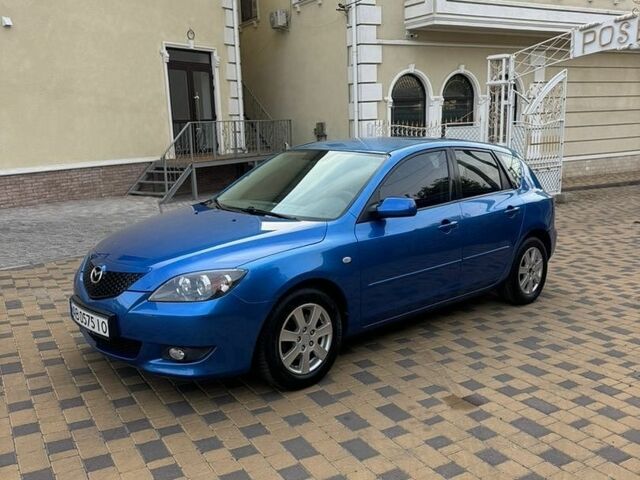 Синий Мазда 3, объемом двигателя 1.6 л и пробегом 268 тыс. км за 4550 $, фото 3 на Automoto.ua