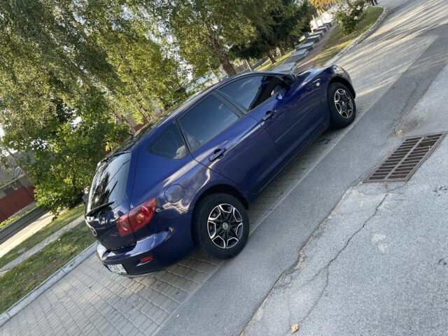 Синий Мазда 3, объемом двигателя 1.3 л и пробегом 270 тыс. км за 3499 $, фото 3 на Automoto.ua