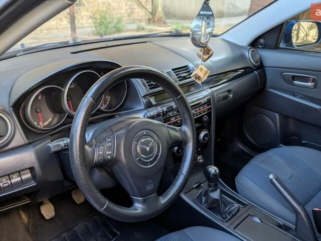 Синий Мазда 3, объемом двигателя 1.6 л и пробегом 325 тыс. км за 4800 $, фото 6 на Automoto.ua