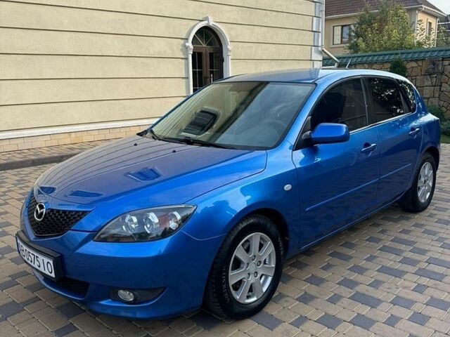 Синий Мазда 3, объемом двигателя 1.6 л и пробегом 268 тыс. км за 4550 $, фото 1 на Automoto.ua